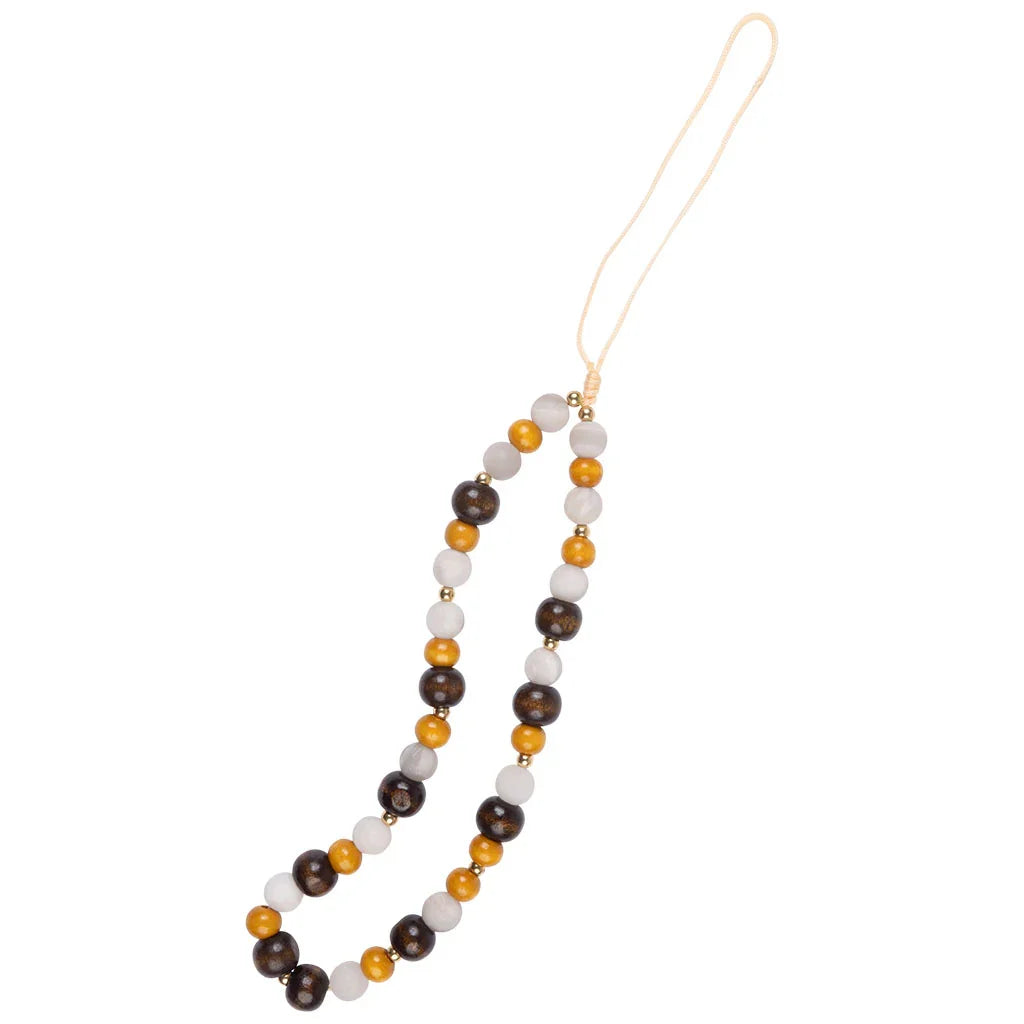 Woodland Charm Wristlet featuring earthy beaded accents for stylish phone carrying